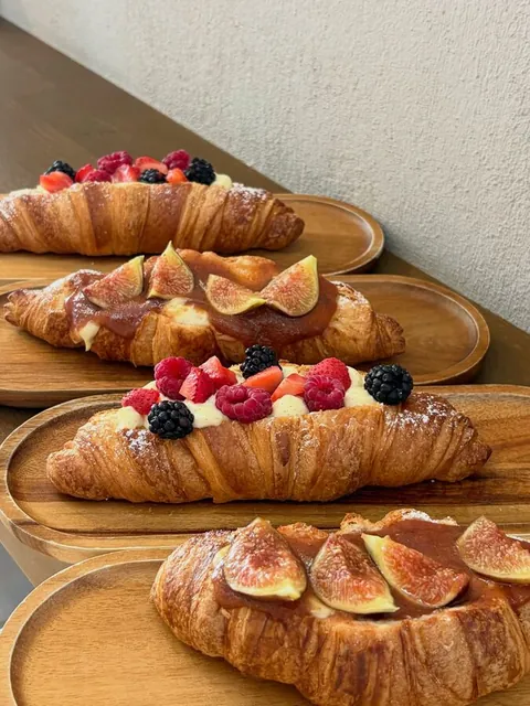 new croissants on display! enjoy the fruits of the season alongside our vanilla cream(••)