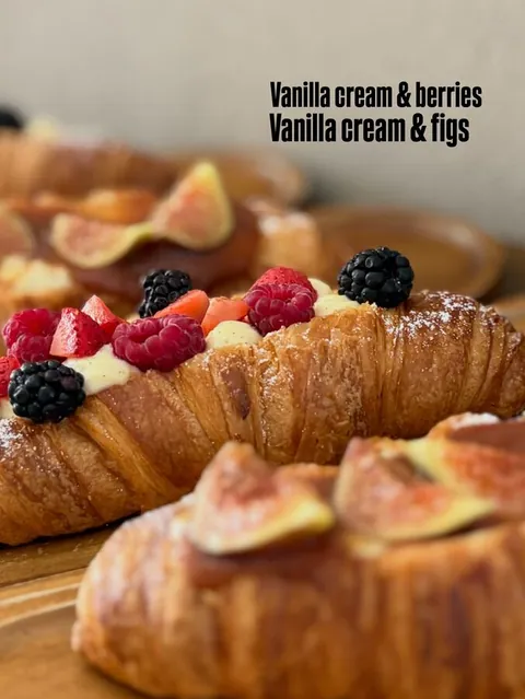 new croissants on display! enjoy the fruits of the season alongside our vanilla cream(••)